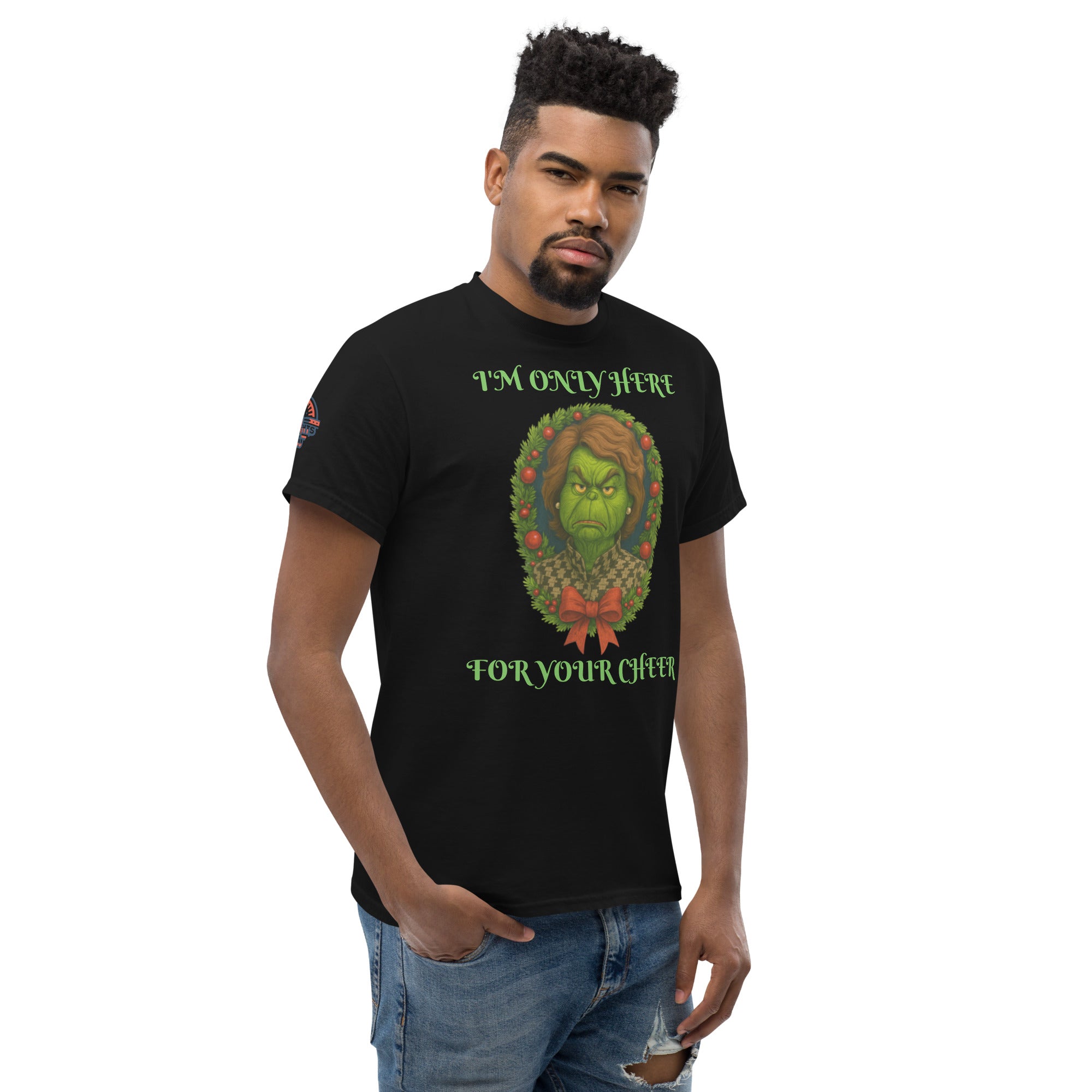 Man wearing black conservative Christmas shirt "I'm Only Here For Your Cheer' - funny political holiday apparel.