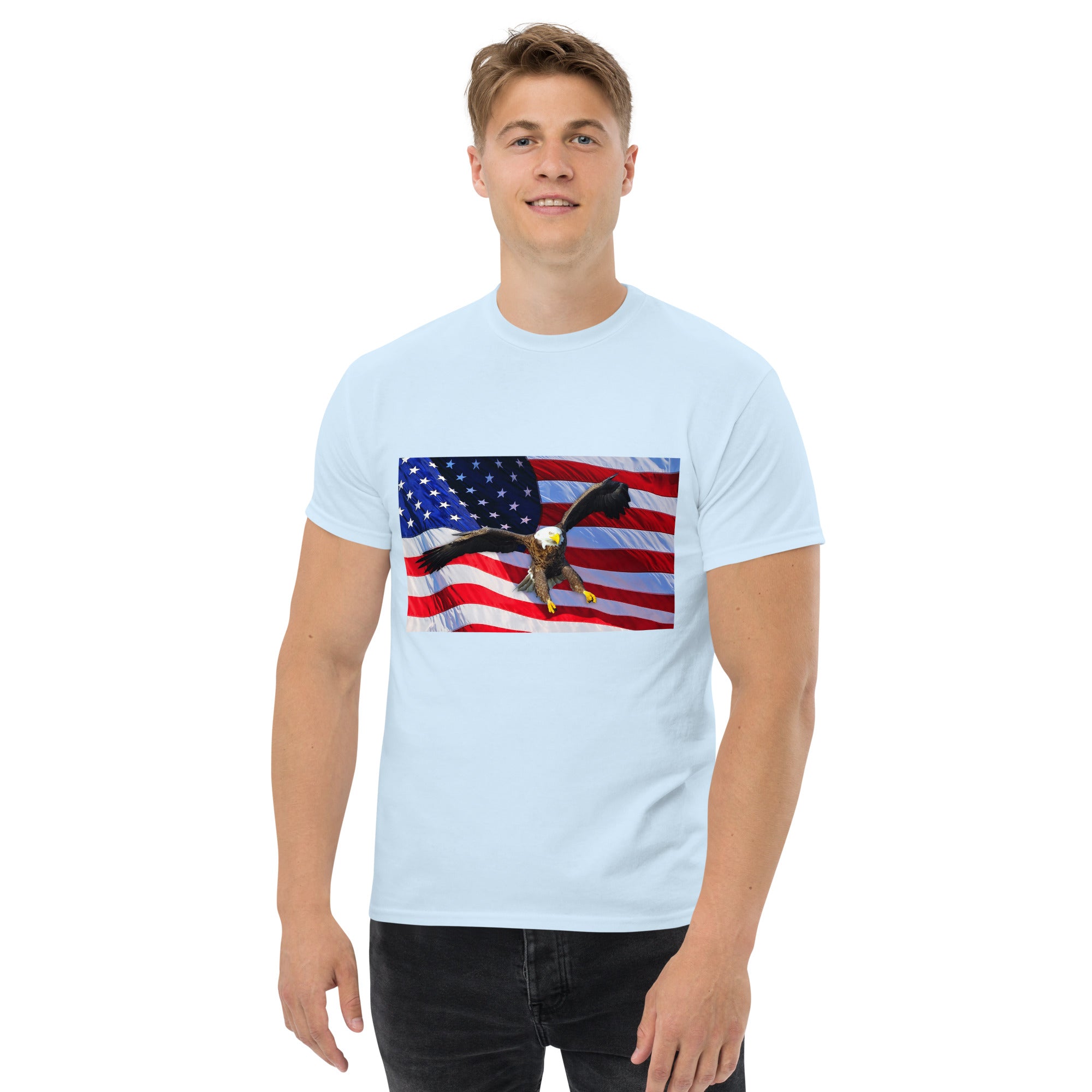 Man wearing a light blue t-shirt with an American flag and bald eagle design.