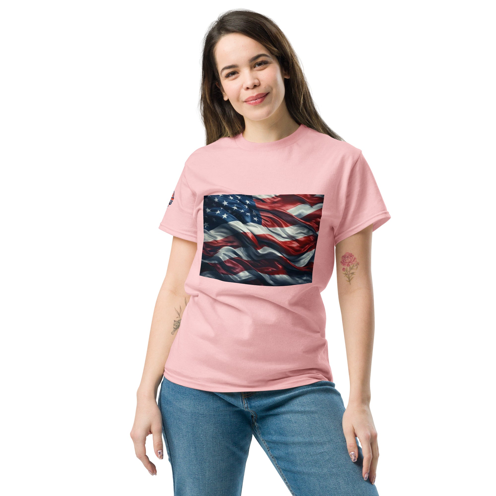 Woman wearing pink Waves of Freedom USA flag unisex T-Shirt