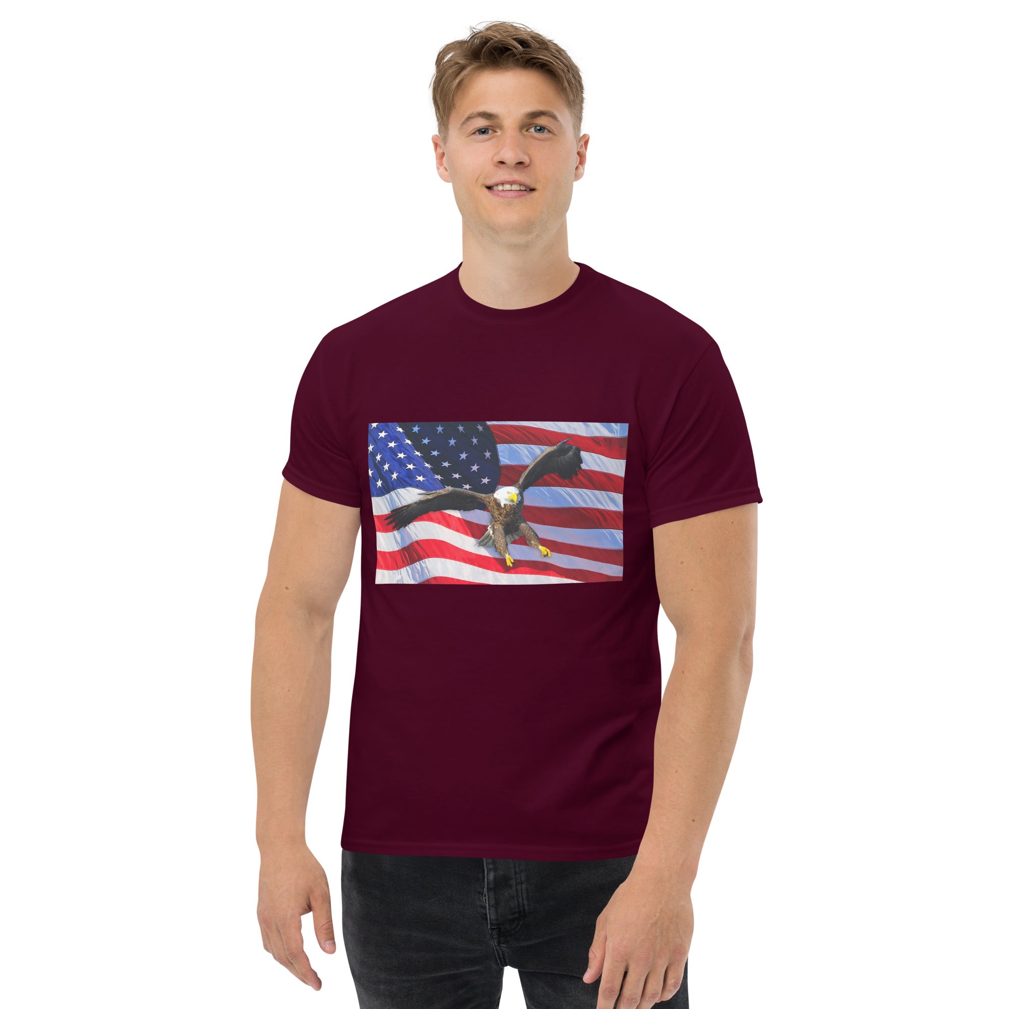 Man wearing a maroon t-shirt with an American flag and bald eagle design 