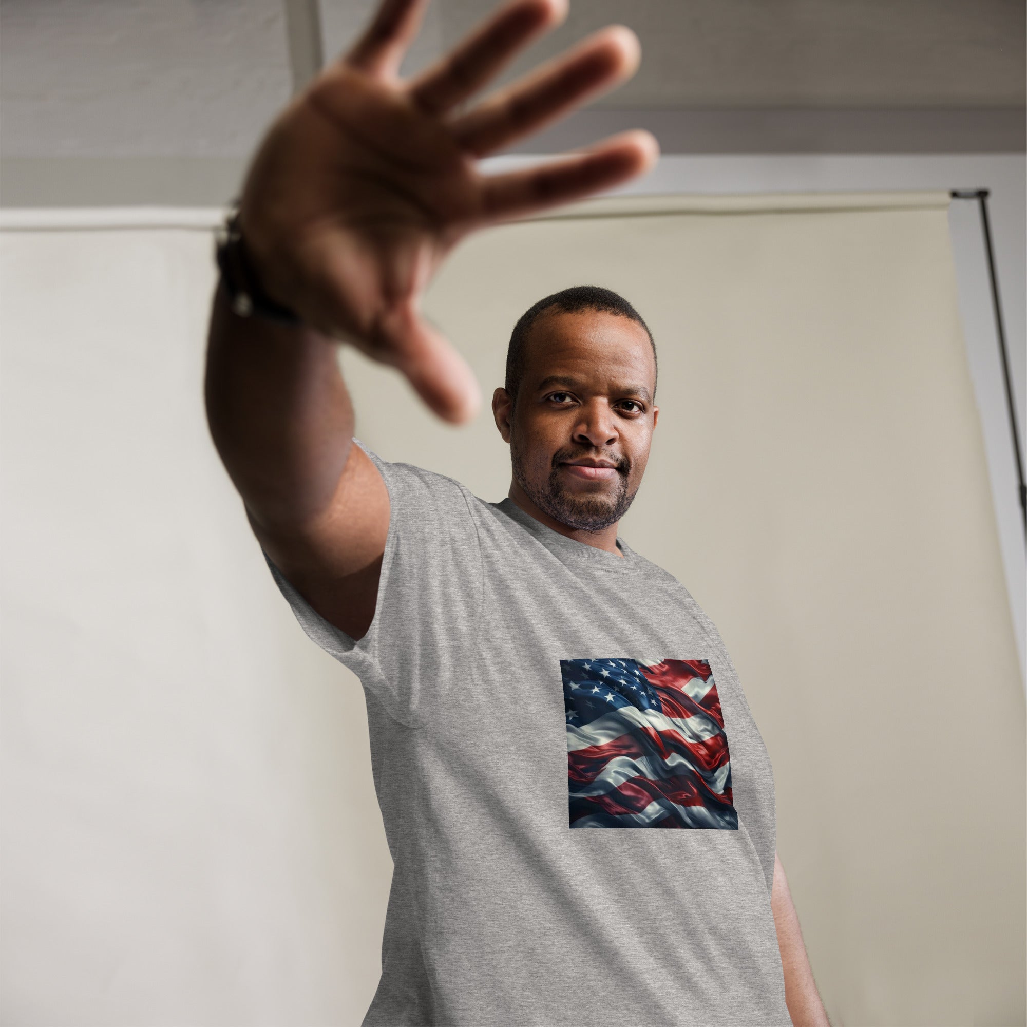 Man wearing big & tall gray Waves of Freedom USA flag T-Shirt