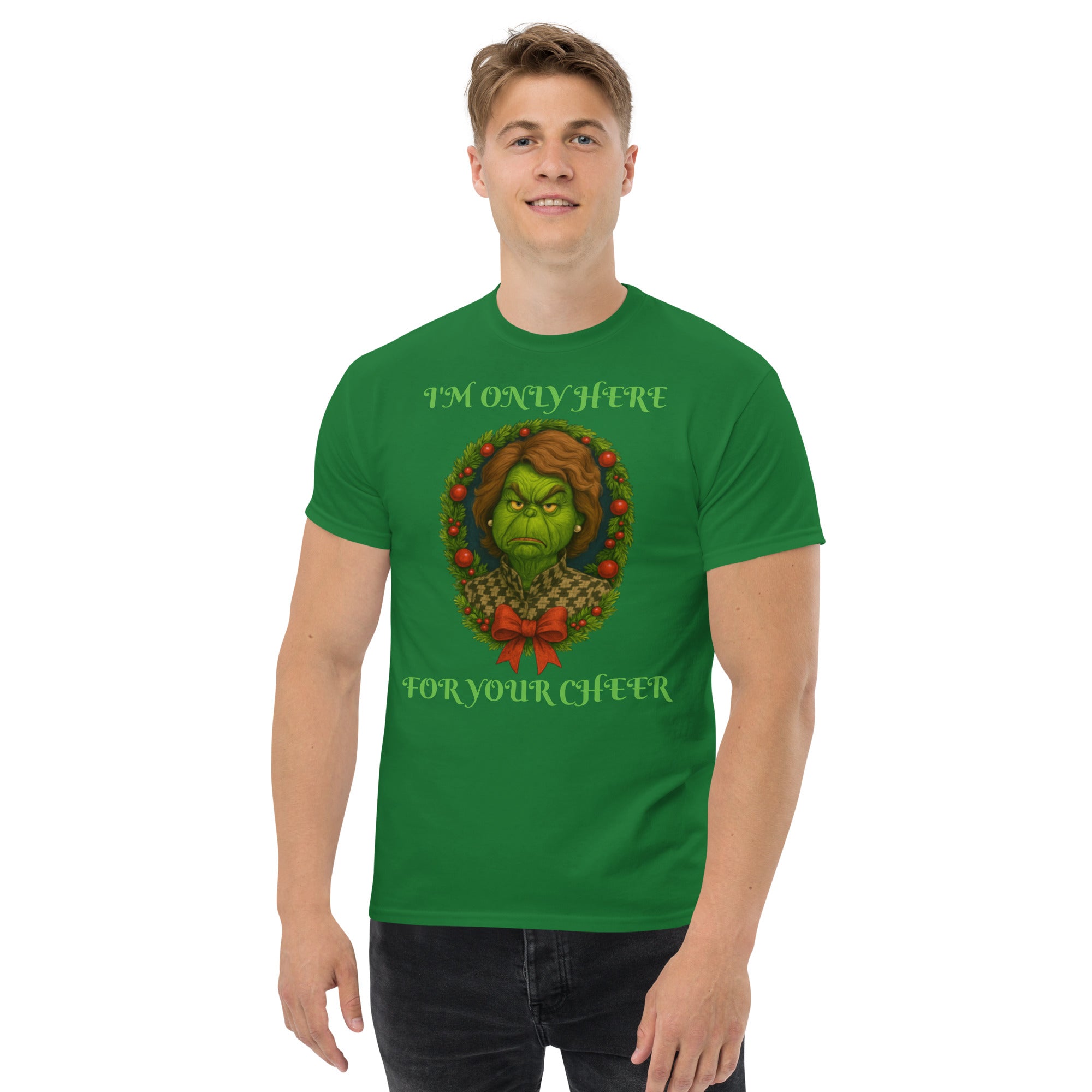 Man wearing green conservative Christmas shirt "I'm Only Here For Your Cheer' - funny political holiday apparel.