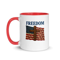 Patriotic FAITH AND  FREEDOM mug featuring USA flag, wooden cross, and bold FREEDOM text – left facing